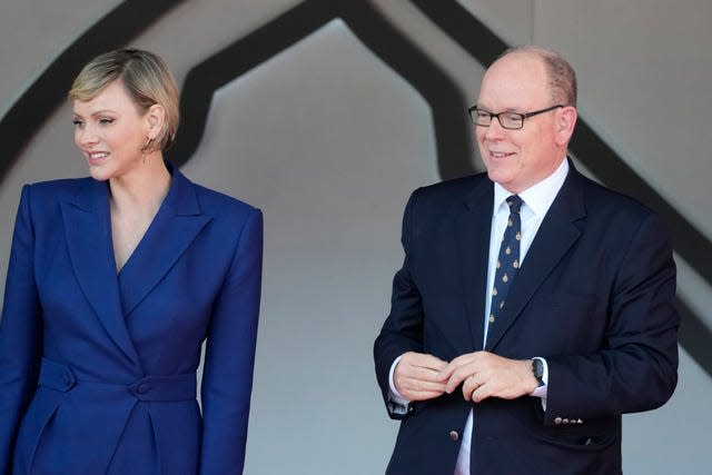 Albert II, Prince of Monaco, right, celebrates Leclerc's victory