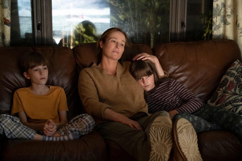 Laura Madden (Jennifer Ehle, center, with Wesley Holloway and Justine Colan) is a Harvey Weinstein accuser who comes forward with her story in 'She Said.'