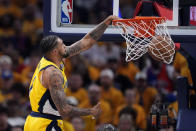 Indiana Pacers forward Obi Toppin (1) dunks the ball during the first half of Game 6 against the New York Knicks in an NBA basketball second-round playoff series, Friday, May 17, 2024, in Indianapolis. (AP Photo/Michael Conroy)