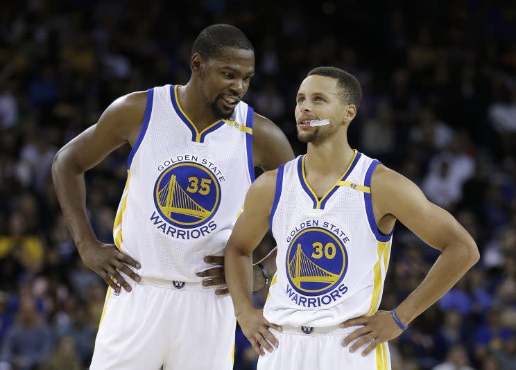 The new CBA affects the Warriors’ plans to retain Kevin Durant and Steph Curry. (AP)