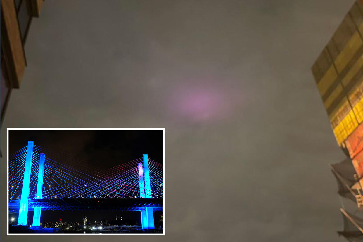 Bright lights reflecting off the Kosciusko Bridge at night, mistaken for Northern Lights