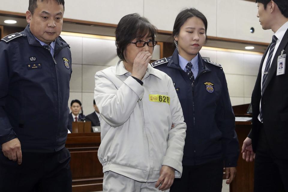 Choi Soon-sil, the jailed confidante of impeached South Korean President Park Geun-hye, appears for her trial at the Seoul Central District Court in Seoul, Thursday, Jan. 5, 2017. (Chung Sung-Jun/Pool Photo via AP)