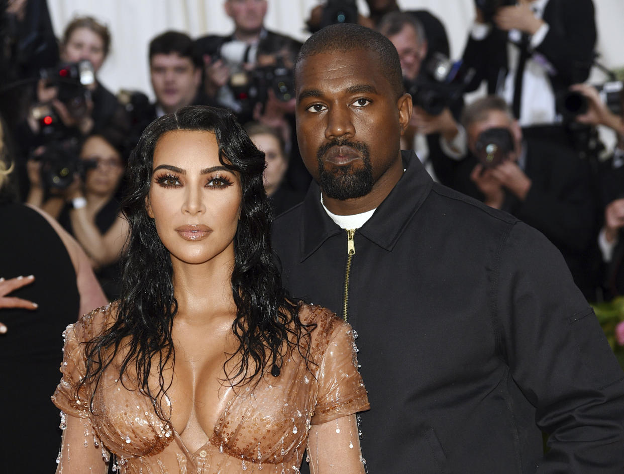 Party of four! Kim Kardashian and Kanye West's newest addition has arrived. (Photo: Evan Agostini/Invision/AP)