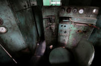 The driver's seat is seen inside an old locomotive used on the Karachi Circular Railway line, in the railway mechanical yard in Karachi, Pakistan, May 25, 2017. REUTERS/Caren Firouz/Files