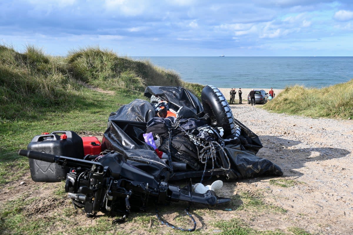 A damaged migrants’ boat, thought to be the vessel that hit trouble while crossing the English Channel, leading to the death of eight people (AFP/Getty)