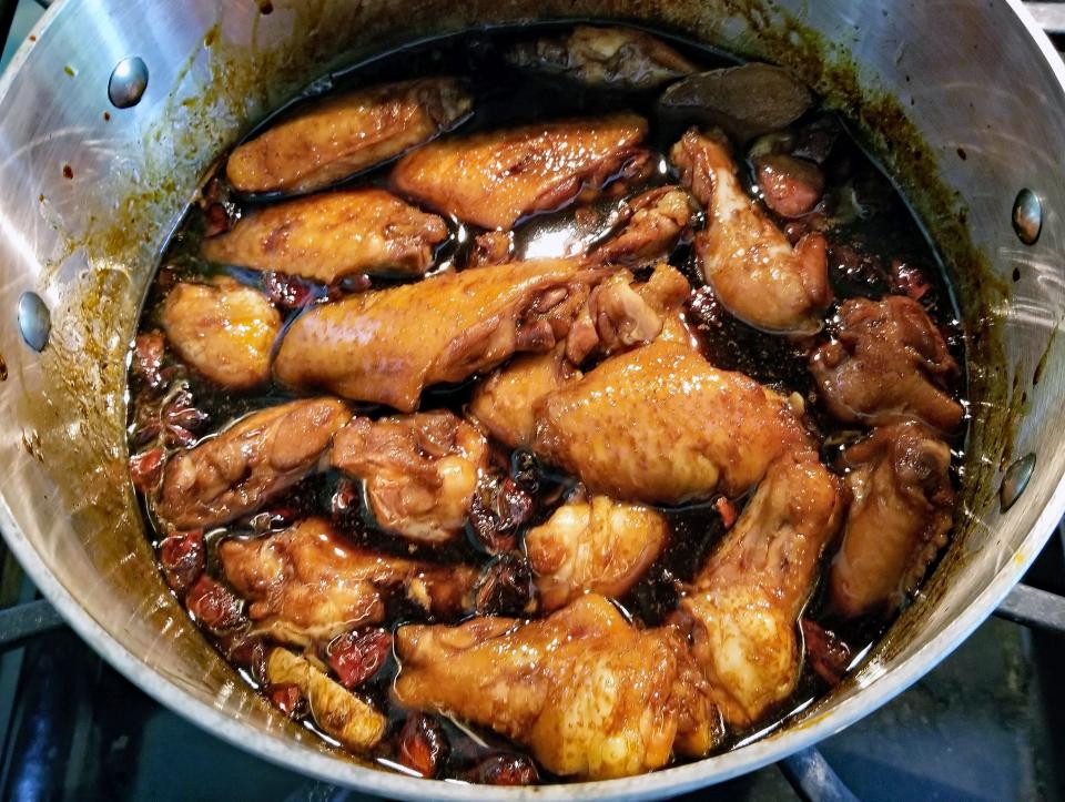 Mabel’s dad, Fung (Tony) Wong, was a master of soy sauce chicken wings. The wings are cooked in a sweet and salty braising liquid that can be reused over and over.