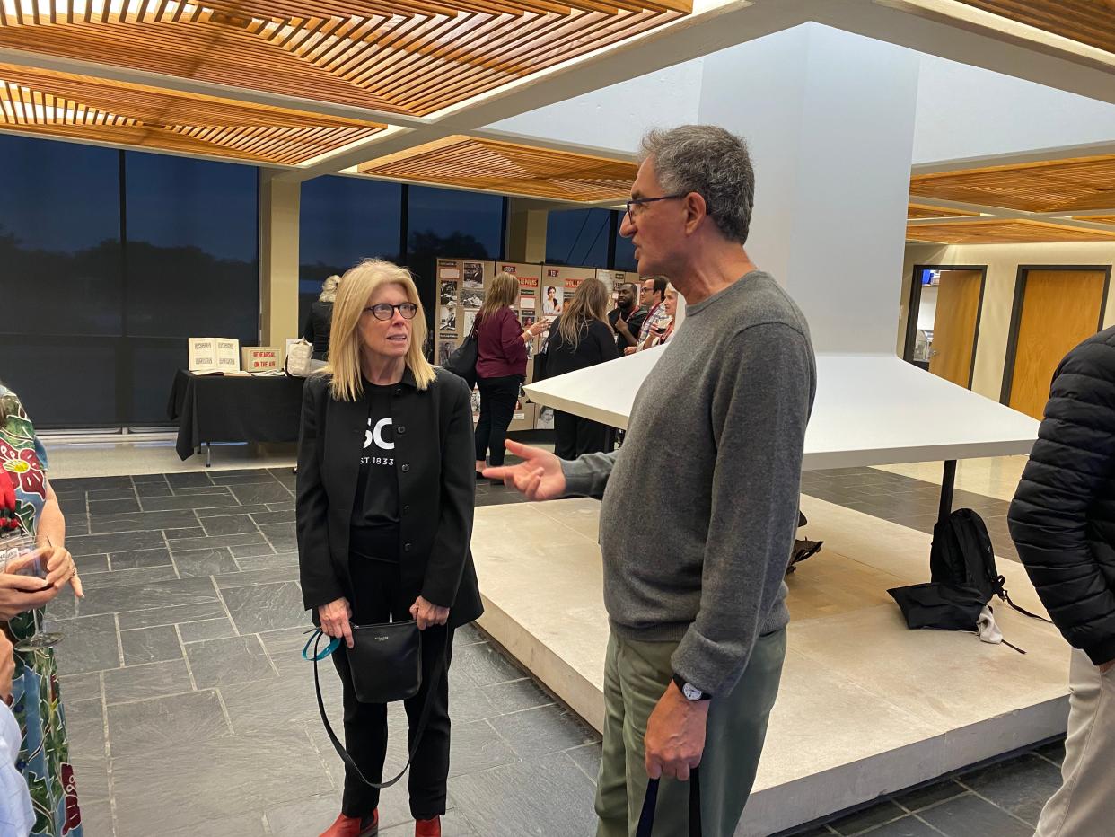 Stephens College President Dianne Lynch, left, speaks with screenwriter Phil Lazebnik at a previous event. Lynch announced her pending retirement Thursday.