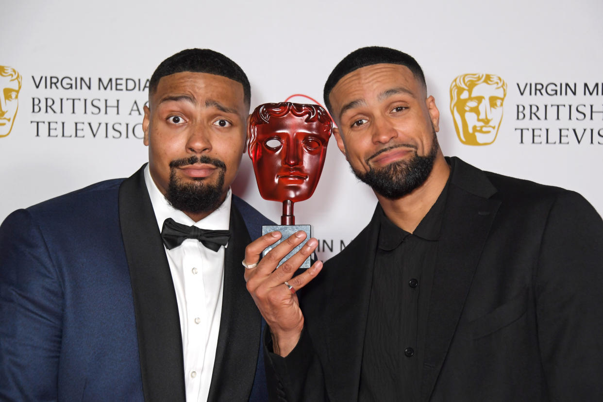 LONDON, ENGLAND - JUNE 06:   Jordan Banjo (L) and Ashley Banjo, accepting Virgin Medias Must-See Moment award for Diversity's performance on 