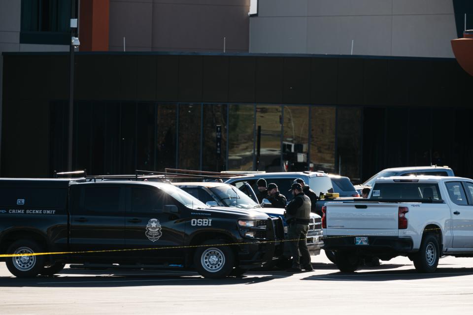 OSBI, the Oklahoma Medical Examiner, Osage County Sheriff's deputies and Osage Nation Police investigate the scene of a deadly shooting outside the new Bartlesville Osage Hotel and Casino Tuesday.