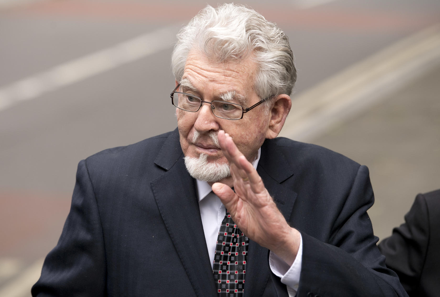 Australian entertainer Rolf Harris arrives at Southwark Crown Court in London on May 22, 2017 for a court hearing accused of four counts of indecent assault. 
Australian entertainer Rolf Harris was released from a British prison this week to attend court in person to face charges of four counts of indecent assault against three teenage girls between 1971 and 1983. He denies the charges.  / AFP PHOTO / Justin TALLIS        (Photo credit should read JUSTIN TALLIS/AFP via Getty Images)