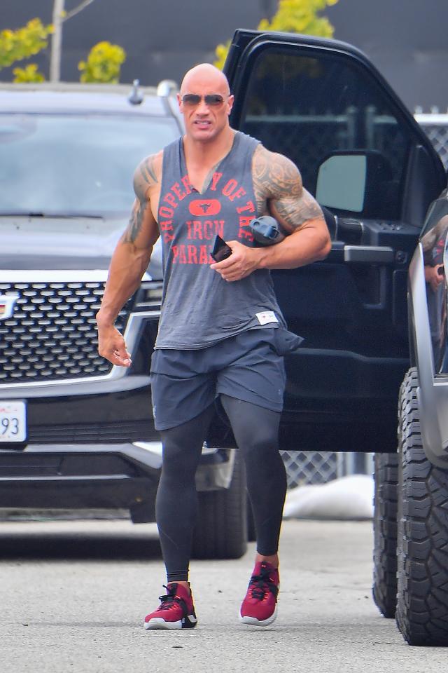Dwayne 'The Rock' Johnson Is Gym-Ready In A Muscle Tee, Workout Leggings &  Project Rock Trainers