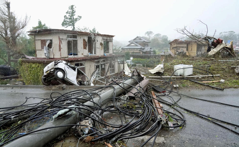 Destroyed houses, cars and power poles, which according to local media were believed to be caused by a tornado, are seen as Typhoon Hagibis approaches the Tokyo area in Ichihara, east of Tokyo, Japan, in this photo taken by Kyodo October 12, 2019.  (Photo: Kyodo/via Reuters)