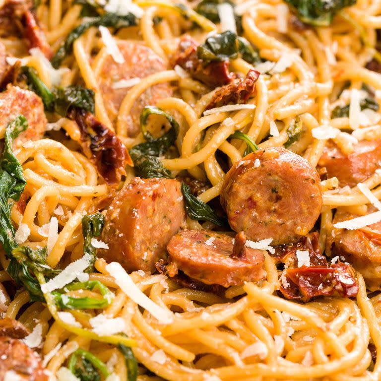 <p>This meaty <a href="https://www.delish.com/uk/cooking/recipes/a28841234/three-ingredient-spaghetti-recipe/" rel="nofollow noopener" target="_blank" data-ylk="slk:spaghetti;elm:context_link;itc:0;sec:content-canvas" class="link ">spaghetti</a> in a cream sauce is the whole package for an easy dinner.</p><p>Get the <a href="https://www.delish.com/uk/cooking/recipes/a31656606/spaghetti-with-sun-dried-tomatoes-sausage-and-spinach-recipe/" rel="nofollow noopener" target="_blank" data-ylk="slk:Spaghetti with Sun-Dried Tomatoes, Sausage & Spinach;elm:context_link;itc:0;sec:content-canvas" class="link ">Spaghetti with Sun-Dried Tomatoes, Sausage & Spinach</a> recipe.</p>