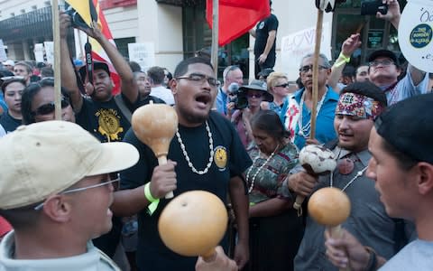 Demonstrators gather outside the Phoenix, Arizona, Convention Center - Credit: AFP