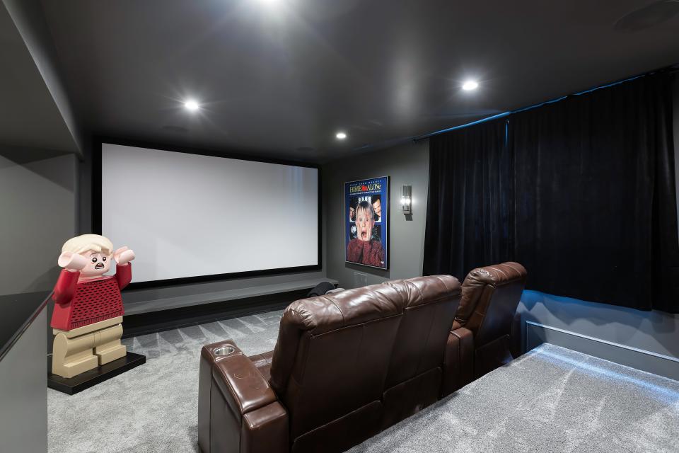 A "Home Alone" themed movie room downstairs.