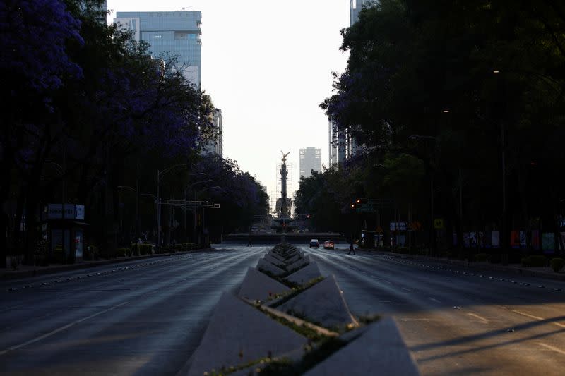 The almost empty Avenida Reforma is seen after Mexico declared a health emergency and issued stricter rules aimed at containing the coronavirus disease (COVID-19), in Mexico City