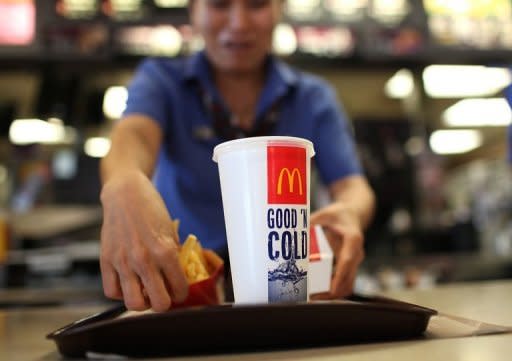 A McDonald's employee prepares an order in 2011 in San Francisco, California. First they began offering salad, then they added fruit. McDonald's announced it would put something else on its menu to help customers watching their waistlines: calorie counts