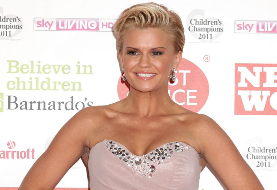 Kerry Katona has had her breasts reduced three times. (PA)