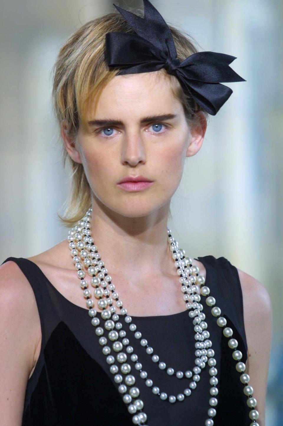 Pretty in pearls: Tennant models for Chanel in 2001/2Miquel Benitez/REX