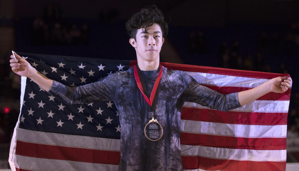Nathan Chen, of the United States celebrates his gold medal win following the mens free skate at the figure skating's Grand Prix Final in Vancouver, Friday, Dec. 7, 2018.(Jonathan Hayward/The Canadian Press via AP)