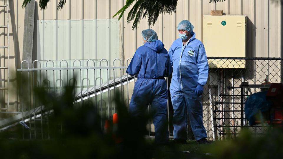 Police at the scene of a murder investigation in Burpengary