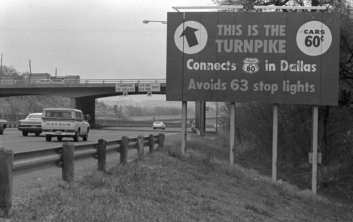 Jan. 1, 1978: As the Dallas-Fort Worth Turnpike was opened to free traffic, this sign remained along the highway saying “This is the turnpike, connects U.S. 80 in Dallas. Avoids 63 stop lights. Cars: 60 cents.”