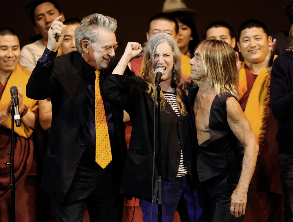 Co-founder of Tibet House U.S. Robert Thurman, left, singer Patti Smith and musician Iggy Pop perform at the 24th Annual Tibet House U.S. benefit concert at Carnegie Hall on Tuesday, March 11, 2014 in New York. Photo by Evan Agostini/Invision/AP)