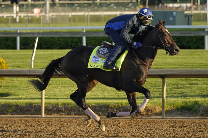 Kentucky Derby hopeful Rock Your World works out at Churchill Downs Tuesday, April 27, 2021, in Louisville, Ky. The 147th running of the Kentucky Derby is scheduled for Saturday, May 1. (AP Photo/Charlie Riedel)