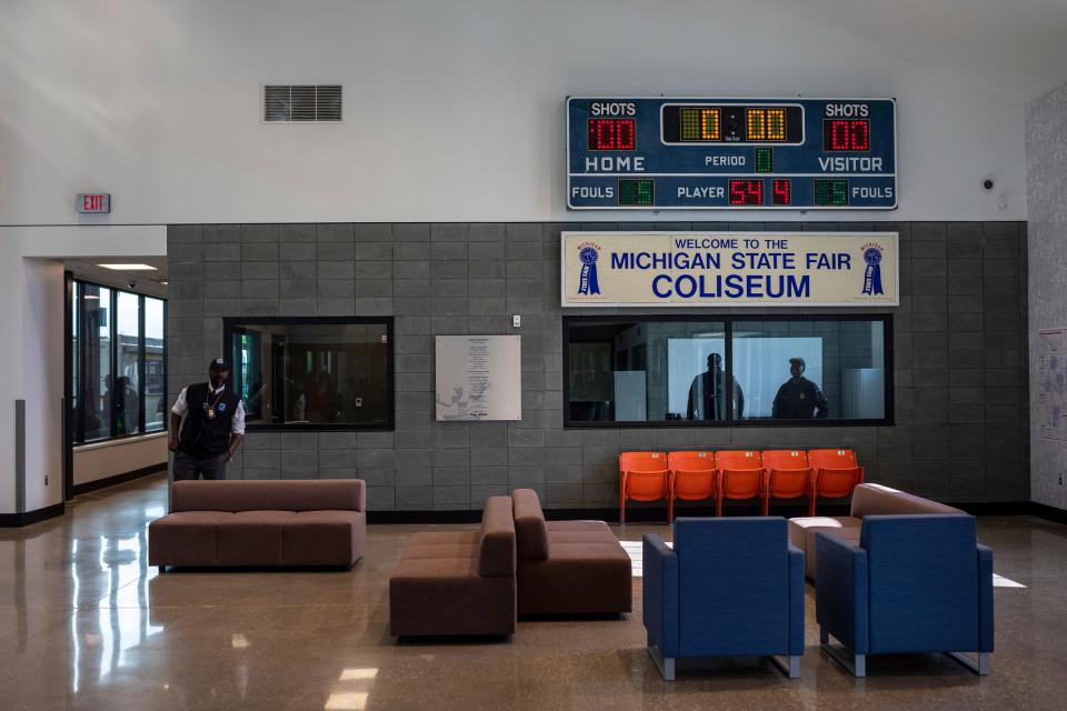 People stand inside the waiting area of Detroit Department of Transportation's new transit center, the Jason Hargrove Transit Center, at the State Fairgrounds on Saturday, May 11, 2024.