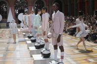 Models wear creations for the Thom Browne mens Spring-Summer 2020 fashion collection presented in Paris, Saturday, June 22 2019. (AP Photo/Michel Euler)