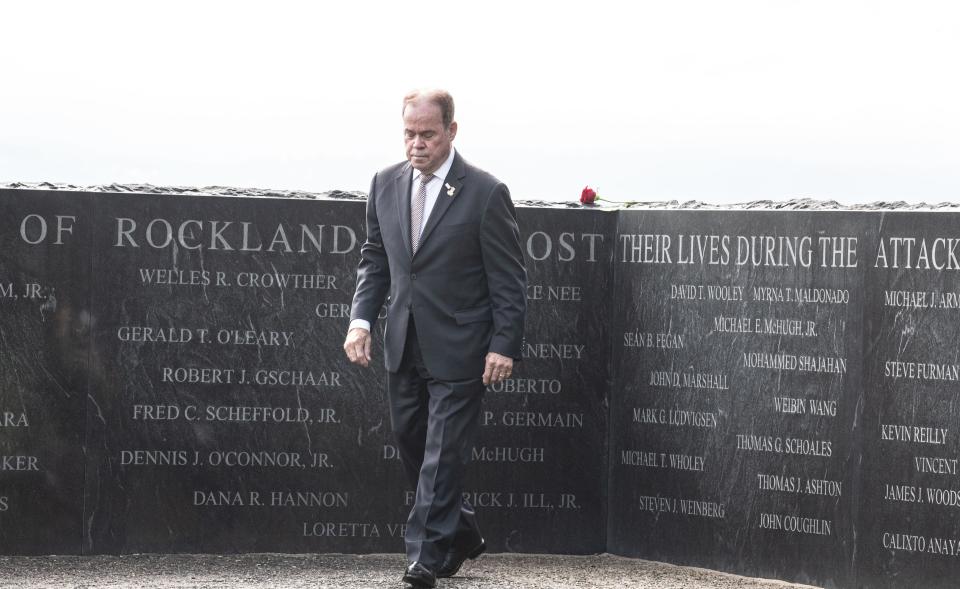 Ed Day, County Executive of Rockland County, walks from the county's 9/11 Memorial after placing a flower during a ceremony Sept. 11, 2023, marking the 22nd anniversary of the Sept. 11 attacks.