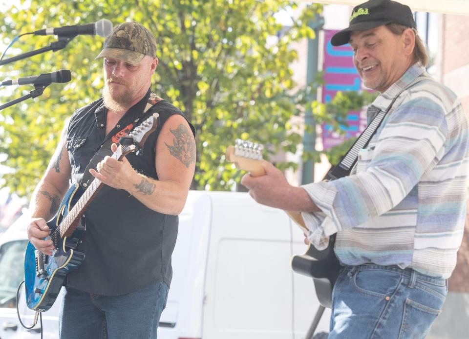 Michael Austin plays saxophone with the Robert Johnson Project at the Downtown Canton Music Fest.