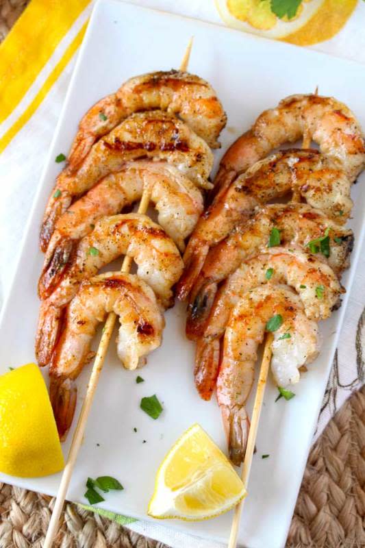 <p>Lemon Blossoms</p><p>These Grilled Shrimp Skewers are seasoned with a simple Cajun butter resulting in the most mouthwatering, succulent and delicious grilled shrimp. An easy appetizer or dinner recipe guaranteed to become a favorite!</p><p><strong>Get the Recipe: </strong><a href="https://www.lemonblossoms.com/blog/cajun-grilled-shrimp-skewers/" rel="nofollow noopener" target="_blank" data-ylk="slk:Cajun Grilled Shrimp Skewers;elm:context_link;itc:0;sec:content-canvas" class="link ">Cajun Grilled Shrimp Skewers</a></p>