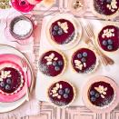 <p>With a softly set homemade blueberry and lemon curd in delicate almond pastry, these tartlets are pretty as a picture. Any leftover curd will keep in the fridge for up to 1 week; delicious on toast!</p><p><strong>Recipe: <a href="https://www.goodhousekeeping.com/uk/food/recipes/a37789589/blueberry-curd-tartlets/" rel="nofollow noopener" target="_blank" data-ylk="slk:Blueberry Curd Tartlets" class="link rapid-noclick-resp">Blueberry Curd Tartlets</a></strong></p>