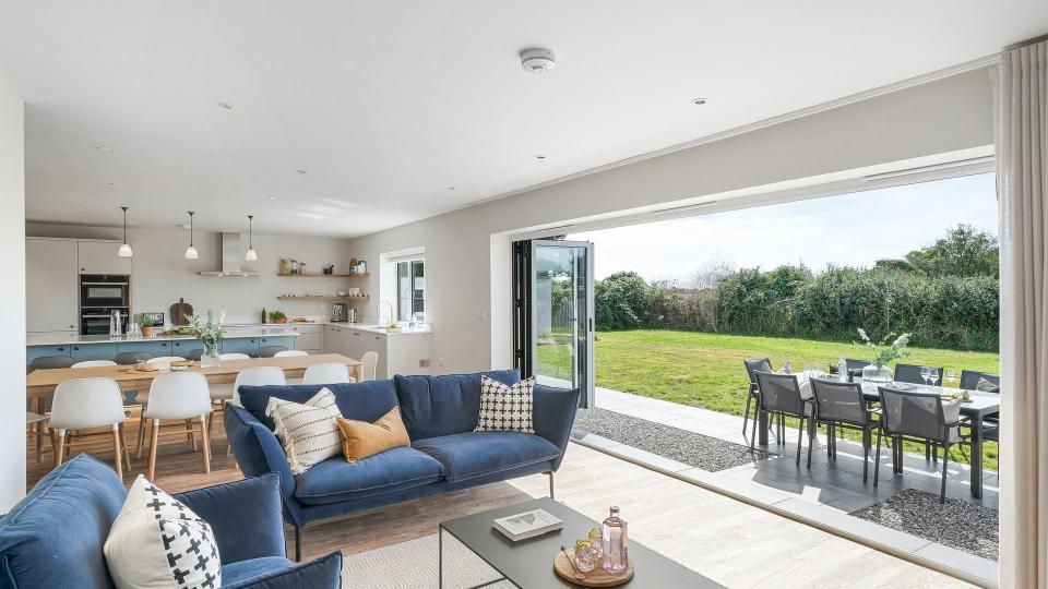 open plan  kitchen with doors onto garden