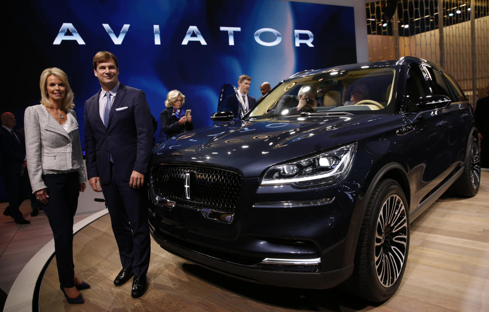 Joy Falotico, Group Vice President, Lincoln Motor Company, and Chief Marketing Officer, and Jim Farley, President, Global Markets, Ford Motor Company, pose next to the 2019 Lincoln Aviator at the New York Auto Show in the Manhattan borough of New York City, New York, U.S., March 28, 2018. REUTERS/Brendan McDermid