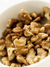 <div class="caption-credit"> Photo by: istock.com</div><b>Walnuts: Inflammation Fighters</b> <br> In addition to containing the most antioxidants of all nuts, which help protect your body from the cellular damage that contributes to heart disease, cancer, and premature aging, "walnuts are also the richest in omega-3 fatty acids, which fight inflammation," says Bauer. They're an especially great way to get these healthy unsaturated fats if you're not a fan of fish, where these types of fats are predominantly found. A walnut snack may also turn around a bad day during that time of the month: The manganese they contain may reduce PMS symptoms. <br> Serving info: About 14 walnut halves = 185 calories, 18 grams fat <br> <p> · <a rel="nofollow" href="http://us.lrd.yahoo.com/SIG=11aidpcal/EXP=1326245898/**http%3A/wp.me/p1rIBL-xJ" data-ylk="slk:Vegetable Juice Recipes - The Right Fat Reduction Approach;elm:context_link;itc:0;sec:content-canvas" class="link ">Vegetable Juice Recipes - The Right Fat Reduction Approach</a> </p> <ul> <li> <a rel="nofollow noopener" href="http://wp.me/p1rIBL-Wi" target="_blank" data-ylk="slk:The Right Vitamin K Nutrition Is Essential to Your Heart Health;elm:context_link;itc:0;sec:content-canvas" class="link ">The Right Vitamin K Nutrition Is Essential to Your Heart Health</a> </li> </ul>< bo