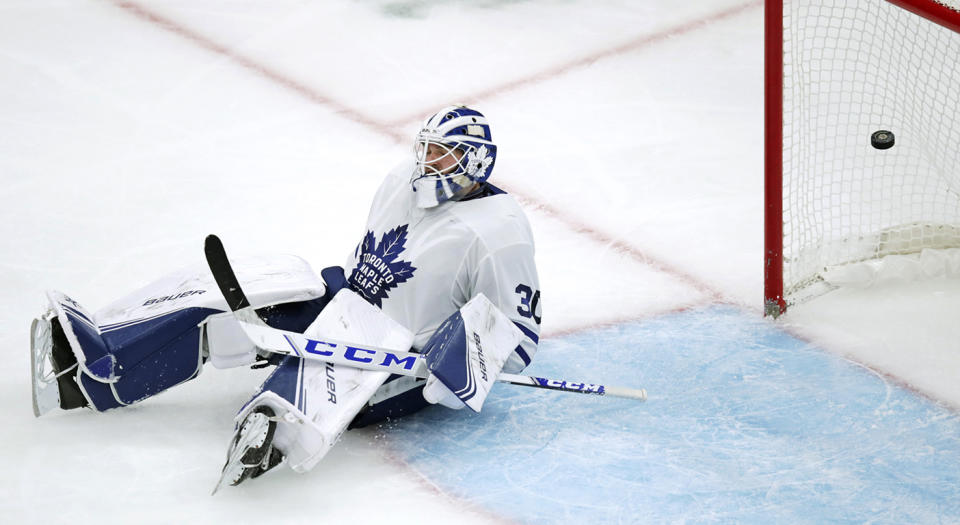 Toronto Maple Leafs goaltender Michael Hutchinson drops to the ice as the puck flies into the net on a goal by Boston Bruins right wing Brett Ritchie during the third period of an NHL hockey game in Boston, Tuesday, Oct. 22, 2019. (AP Photo/Charles Krupa)