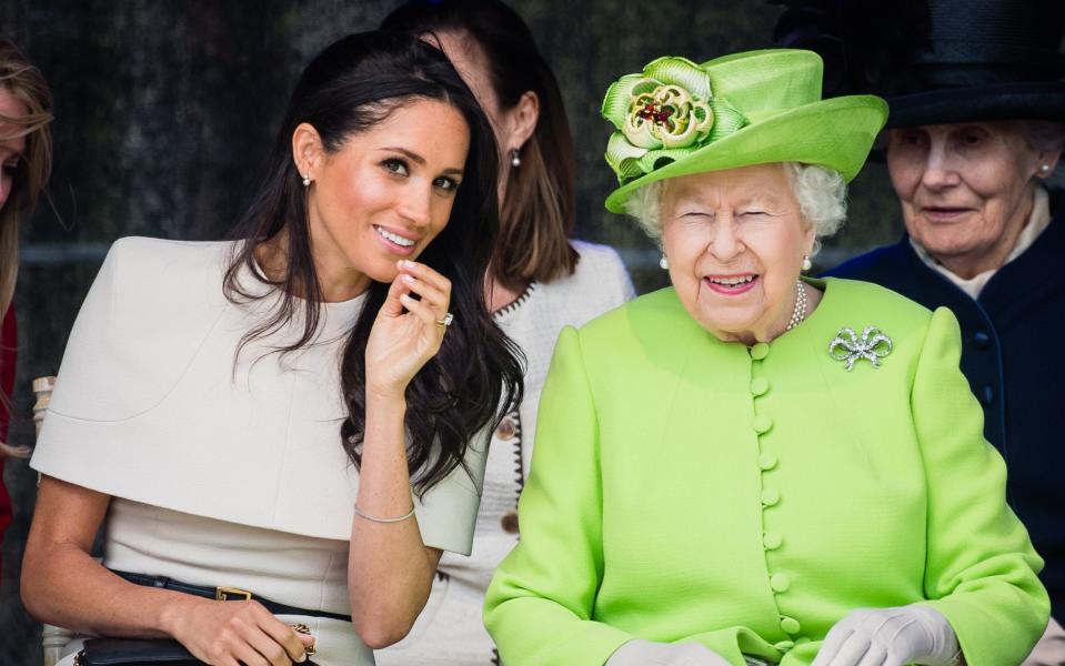 The Duchess of Sussex alongside the Queen at their first joint engagement in June 2018 - Samir Hussein/Samir Hussein/WireImage