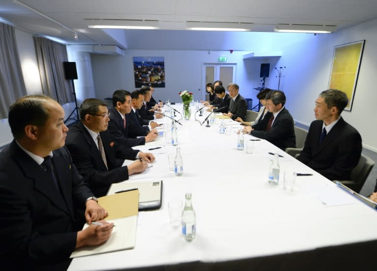 Japanese (R) and North Korean delegations meet in Stockholm on May 26, 2014, to discuss a range of issues, including abductions of Japanese nationals by Pyongyang's spies in the 1970s and 1980s