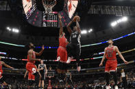 San Antonio Spurs forward DeMar DeRozan (10) shoots over Chicago Bulls forward Cristiano Felicio (6) during the second half of an NBA basketball game Monday, Jan. 27, 2020, in Chicago. (AP Photo/David Banks)