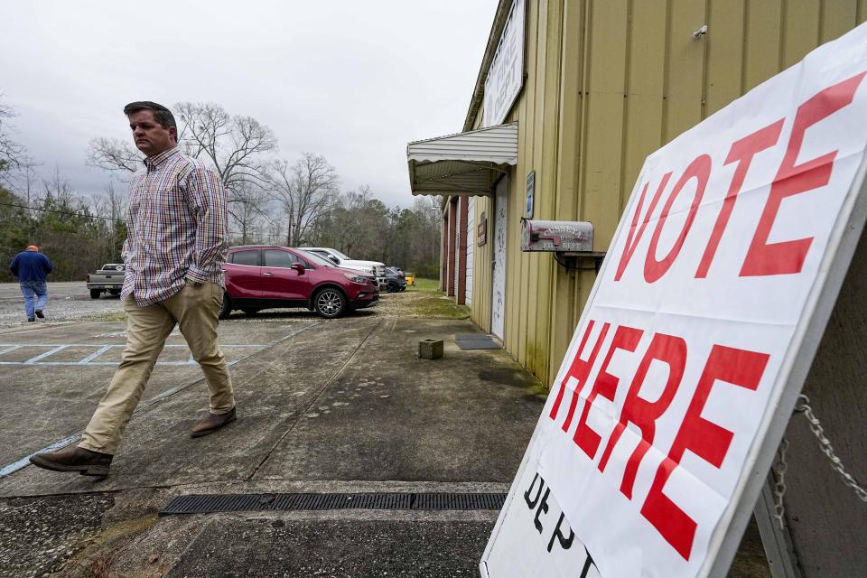 A voter enters the election station during a primary election, Tuesday, March 5, 2024, in Cusseta, Ala. Fifteen states and a U.S. territory hold their 2024 nominating contests on Super Tuesday this year. (AP Photo/Mike Stewart)