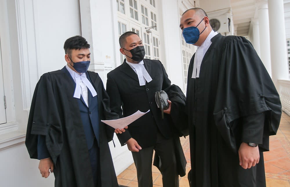 Lawyers who represented the parents of a five-old-year girl who was granted Malaysian citizenship, at the High Court in Ipoh October 25, 2021. — Picture by Farhan Najib