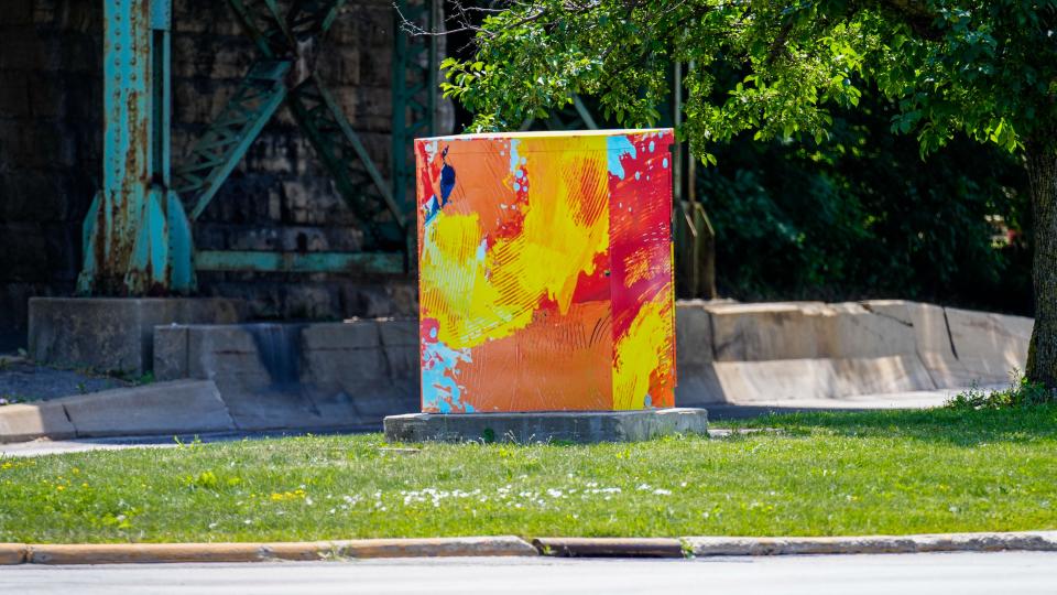 A utility box at 84th & National (north side of bridge) is wrapped with art by Carole Milos as seen on Friday, July 21, 2023. The box is one of 11 selected for the City of West Allis public art utility box program.