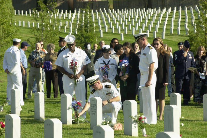 Last month, the Department of Veterans Affairs announced that more than 60 of its national cemeteries would host National Day of Service events, such as those conducted this past year at Arlington Cemetery. File Photo by Alex Thompson/UPI