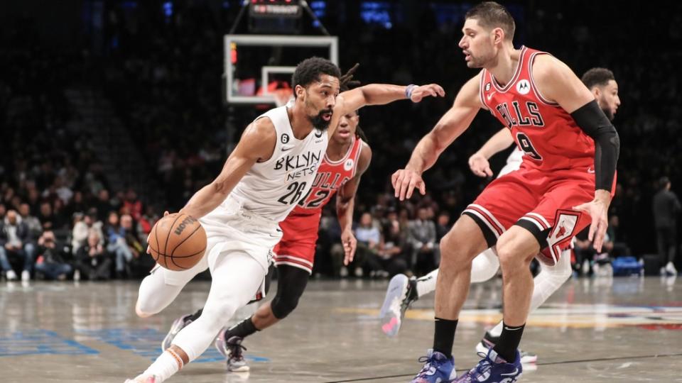 Feb 9, 2023; Brooklyn, New York, USA; Brooklyn Nets guard Spencer Dinwiddie (26) looks to drive past Chicago Bulls center Nikola Vucevic (9) in the second quarter at Barclays Center.