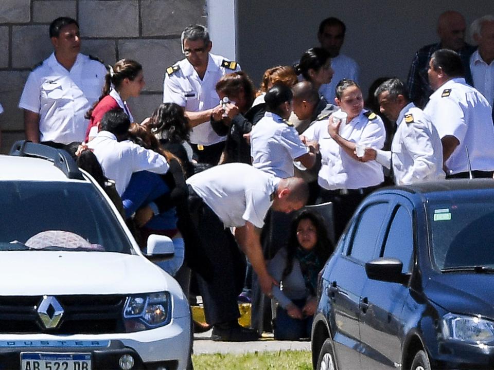 Relatives and comrades of 44 crew members of the missing submarine at an Argentinian naval base.