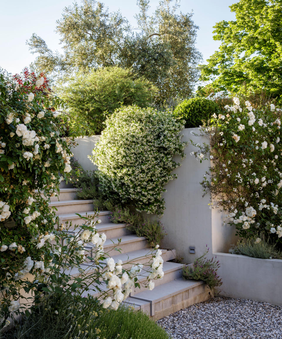 Add flower beds to bring charm to your entrance