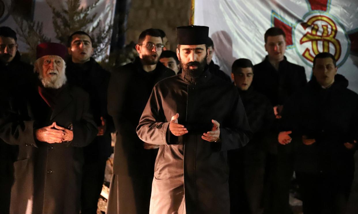<span>Armenian priests in Jerusalem celebrate their new year in January, on land sold off to developers. </span><span>Photograph: Quique Kierszenbaum/The Guardian</span>