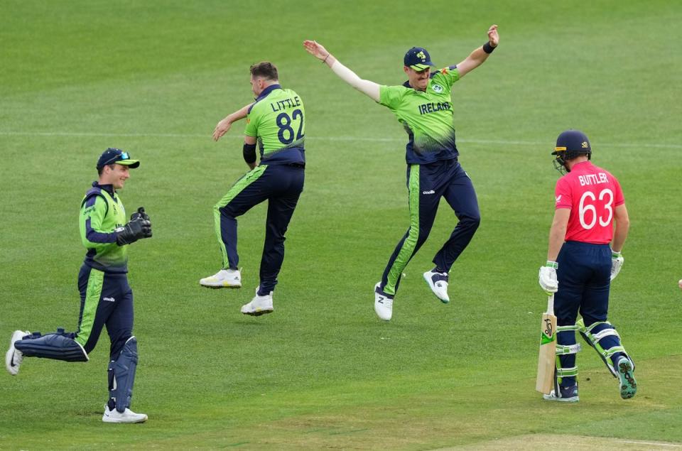 Ireland celebrate the key wicket of England captain Jos Buttler (PA)